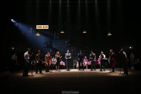 Concert lighting — silhouettes against the rig