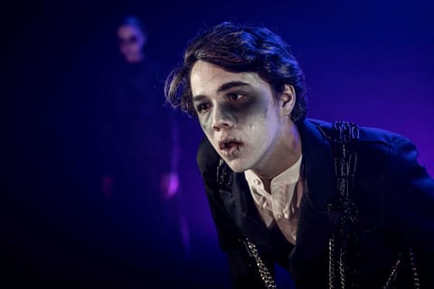 Amadeus — dramatic key light on the principal
