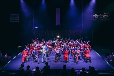 We Will Rock You — arena-style lighting rig in action